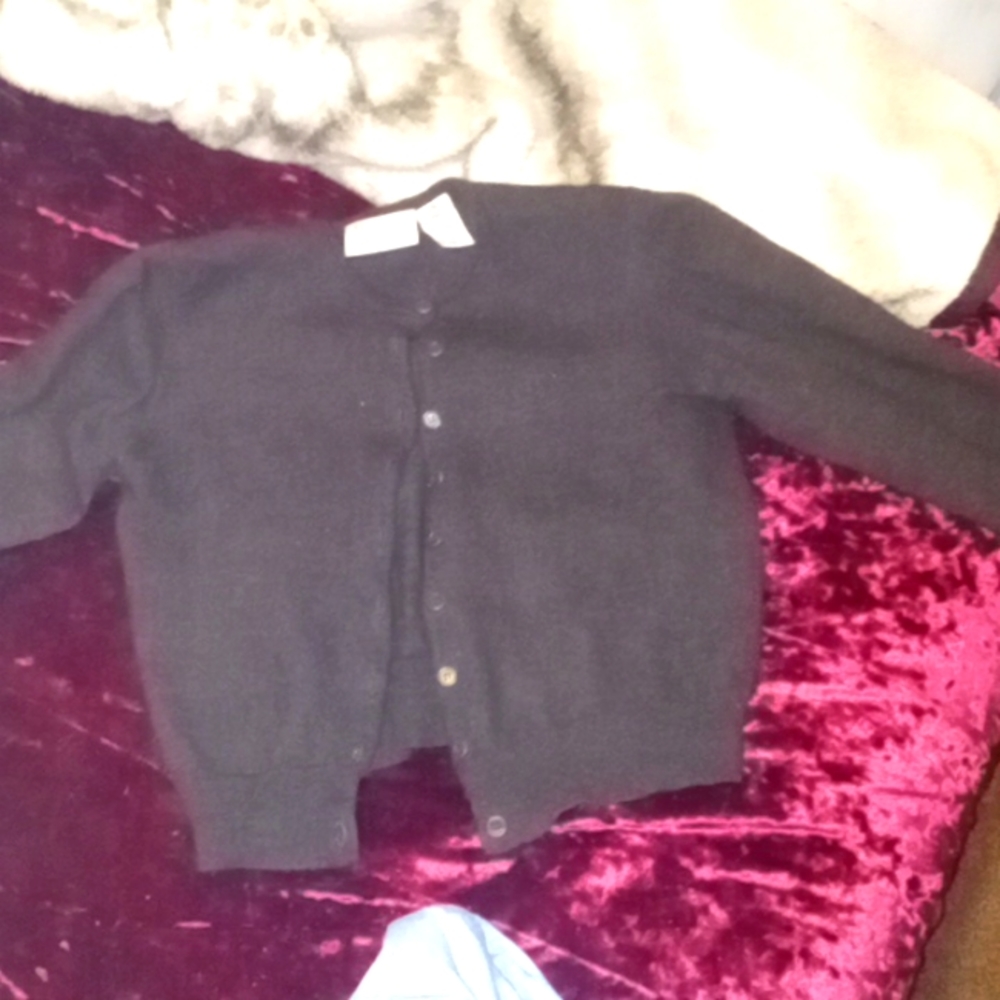 Brand new condition. Girls large wool sweater. Very nice quality.